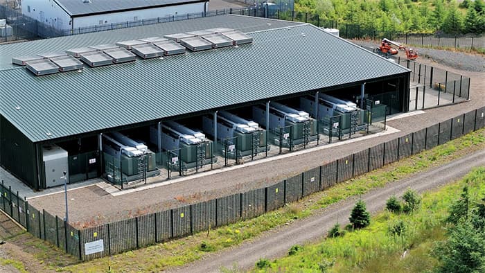 Battery energy storage containers in a fenced compound