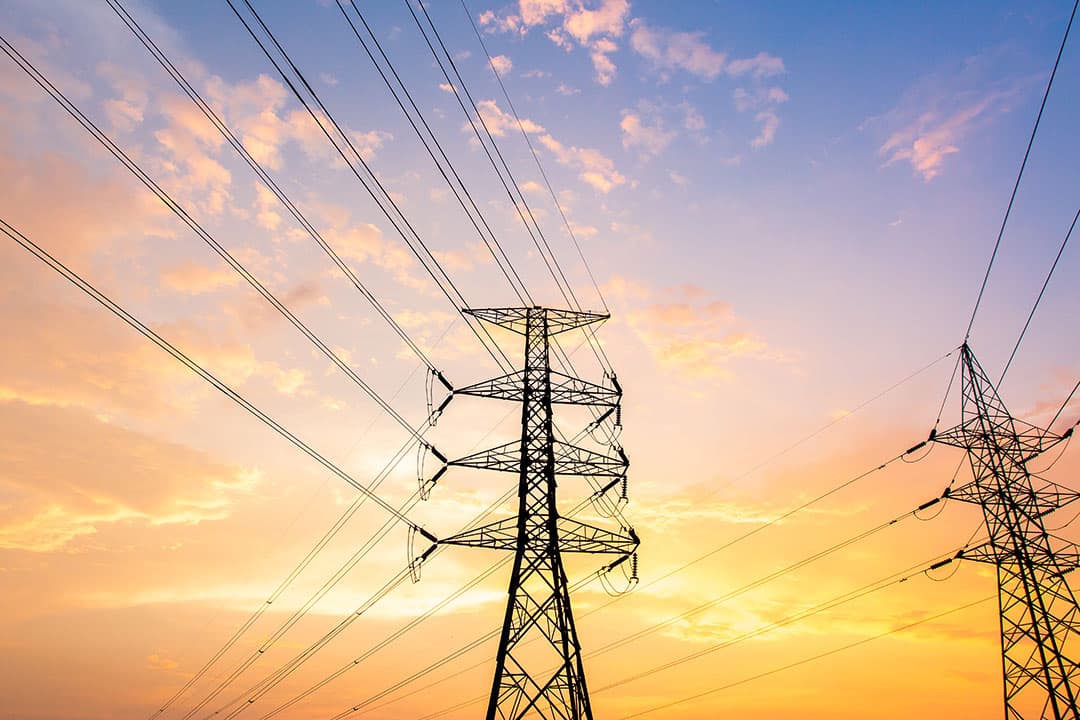 Transmission lines at sunset